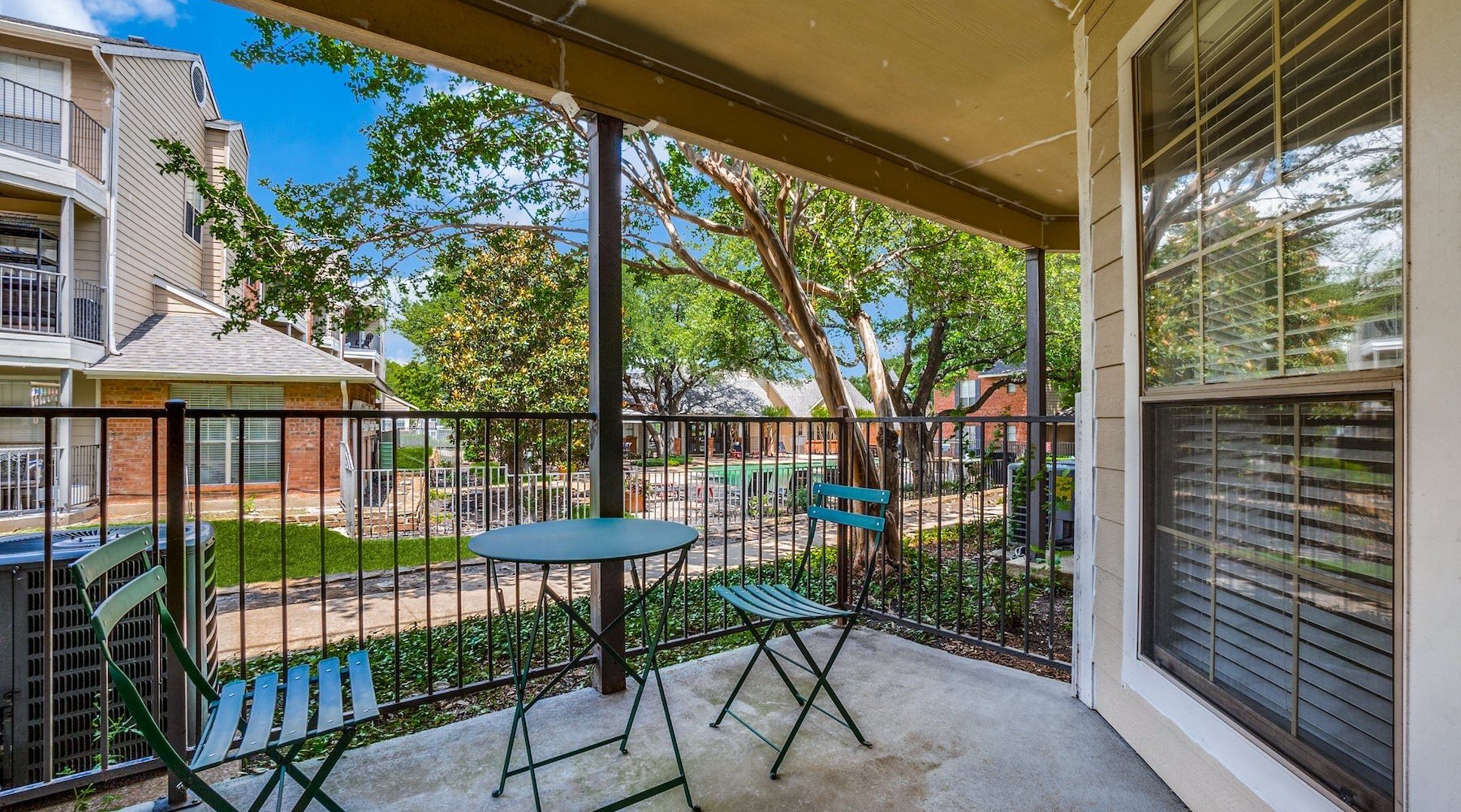 porch area with chairs and table