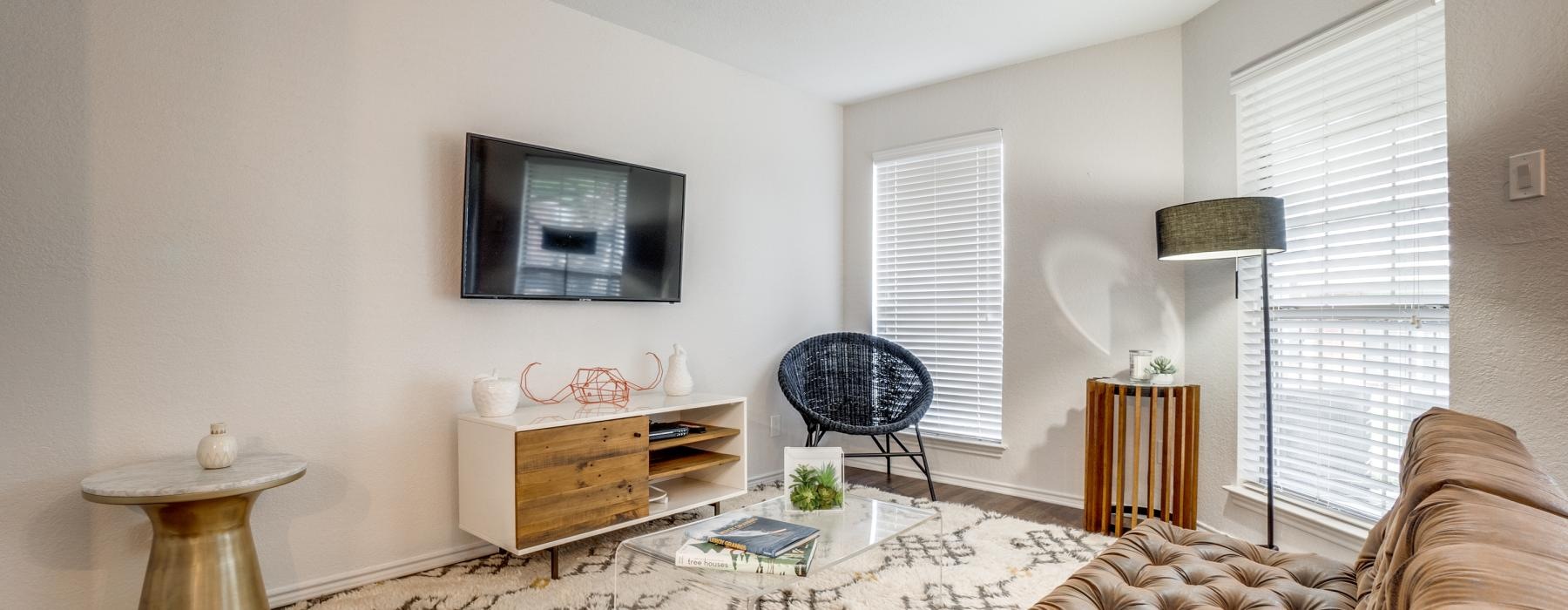a living room with a couch and a table