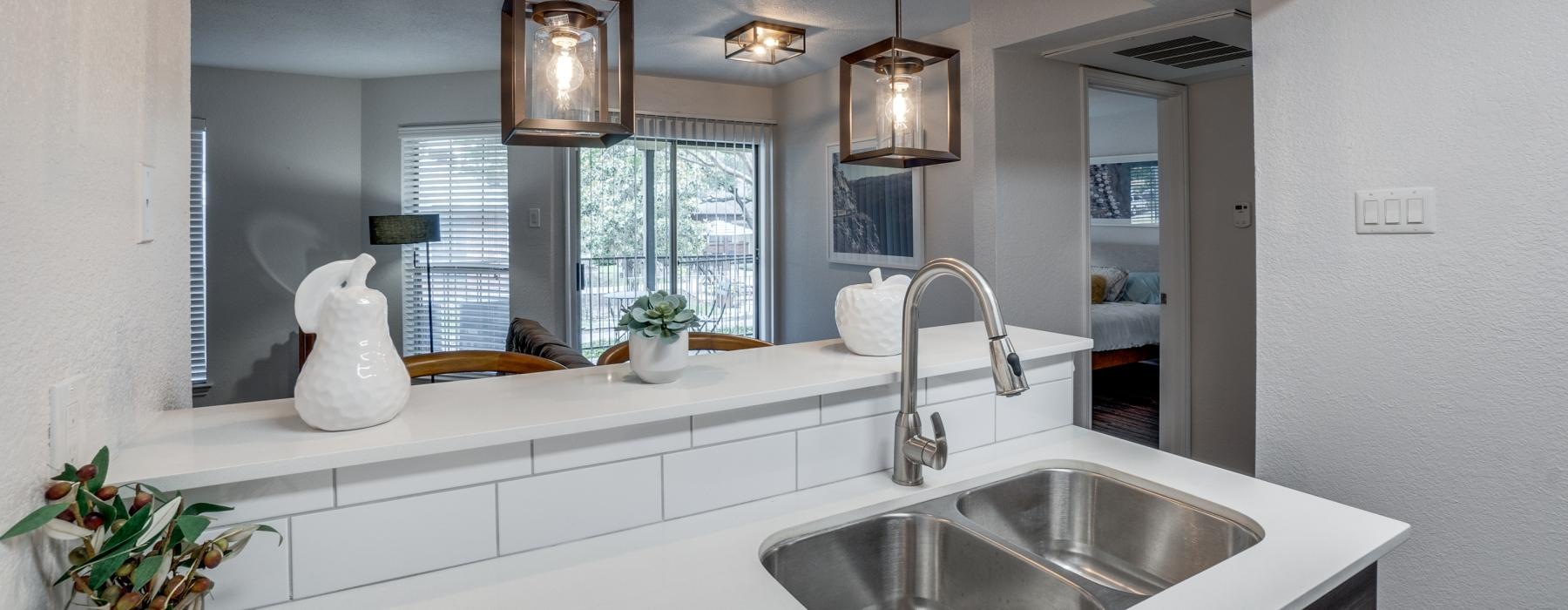 a kitchen with a large mirror