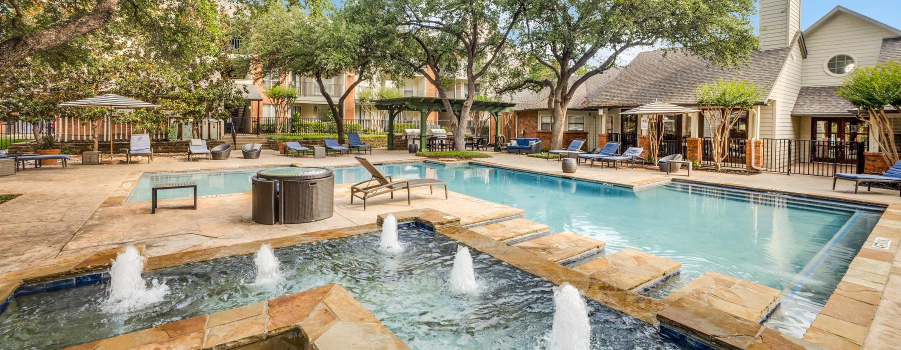a pool with a fountain in it